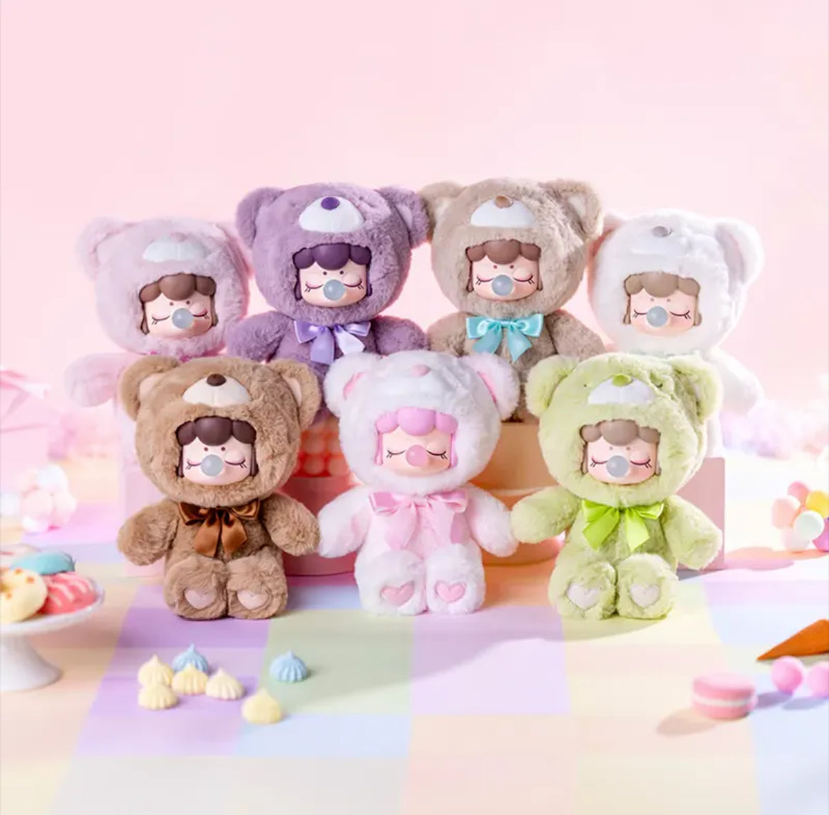 Complete collection of 7 Nanci Chocolate Cutie Bears in pastel colors with ribbon bows