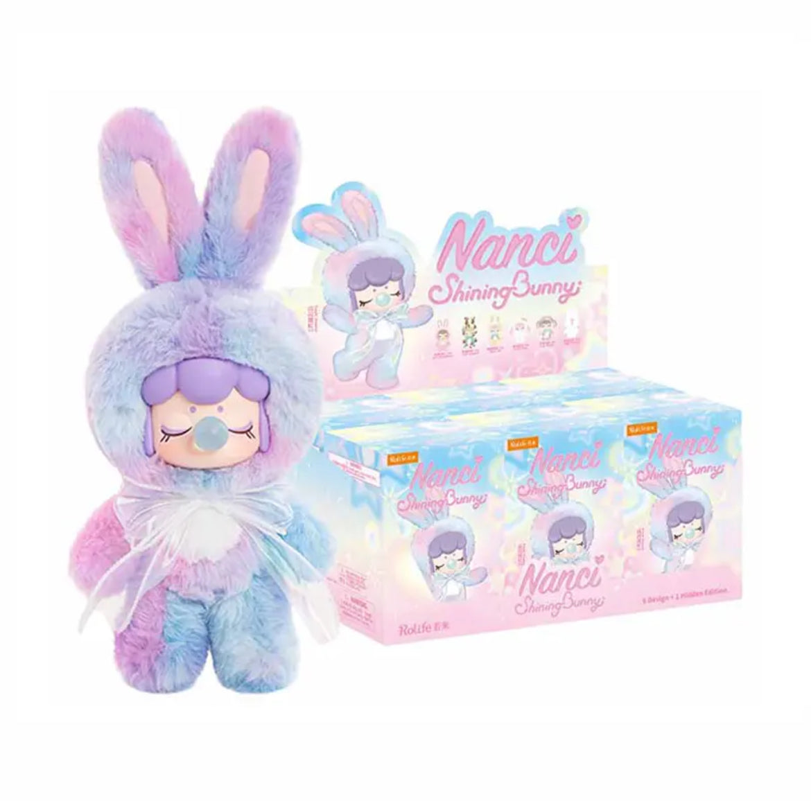 Kawaii bunny blind box plush - collectible mystery crochet series by Sparkling Pineapple
All 7 kawaii bunny plush characters including secret . 
Kawaii bunny plush size comparison - approximately 10 inches tall
Mystery blind box unboxing experience with tissue paper wrapping
Collectible kawaii bunny plushies displayed on shelf with natural lighting